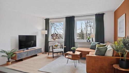 MAISUITES Sperling - Zentrale Ferienwohnung mit Boxspringbett, Kaffeevollautomat, WLAN & seitlichem Seeblick - Foto 3