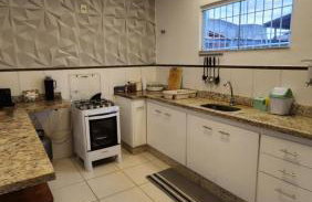 Casa confortável pertinho da praia com garagem e quintal - Foto 31