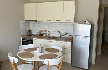 Astron Apartments - Photo 7