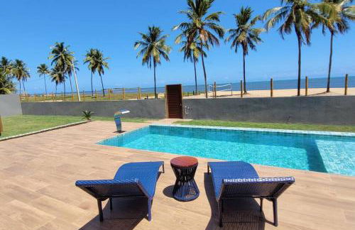 Piscina aquecida, 5 suítes e pé na areia com vista espetacular!! - Photo 7