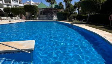 Two bedroom, two bathroom, balcony, pool area, view - Photo 5