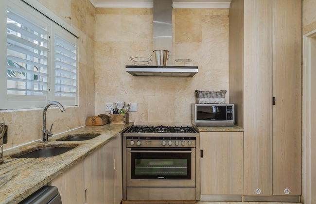 Beach-style Camps Bay Home w Pool Garden Barbados - Photo 21