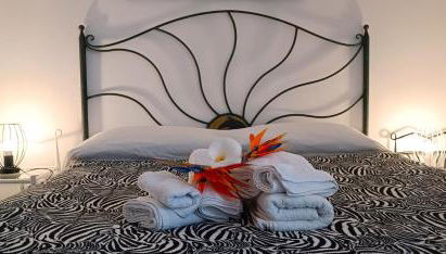 Baia del Conte Apartments Porto Cesareo - Appartamenti in villa sul mare Tabu-Dune - Foto 5, furniture, towels