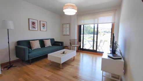 Un rincón con vistas a la Ría, playa y parking. - Foto 5