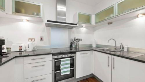 Stylish 2-Bed Canary Wharf Flat DLR 3 Mins Dock Views - Foto 3