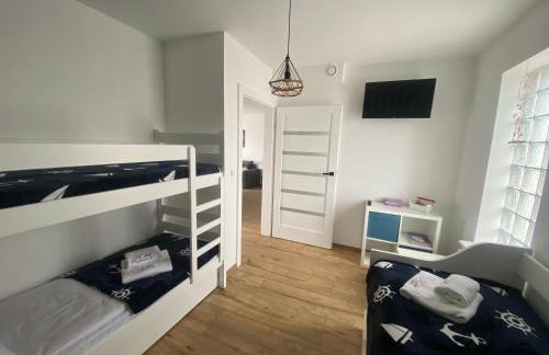 SOLEK, Apartamenty hotelowe i pokoje gościnne ze śniadaniem, przyjazne zwierzętom, wyjątkowe, z widokiem na Jezioro Jamno i w bardzo bliskiej odległości od morza - Foto 37