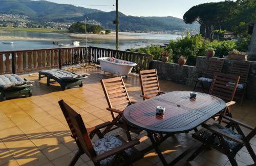 Casa de madera sobre el mar - Foto 8