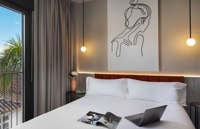 Coeo Peña Design Apartments - Photo 13