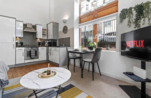 Sleek Modern City Apartment - Photo 6