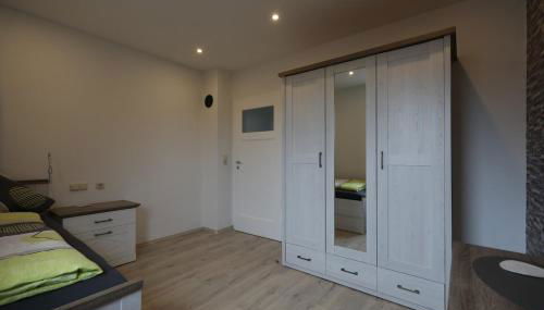 Ferienwohnung Bornweg - Photo 4, wardrobe