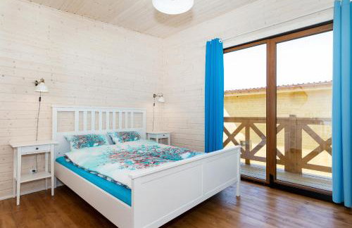 Domki przy plaży Owocowy Ogród - Photo 13