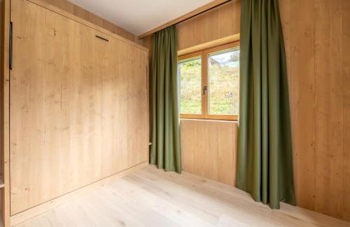 Ama Dolomiti - Residence - Photo 56