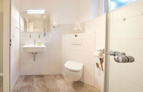 Ferienwohnung Brise 5, mit Spielscheune direkt am Wittensee - Photo 15