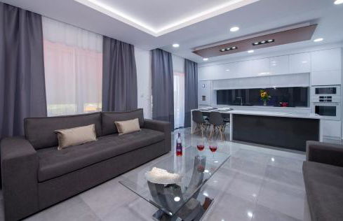 TWIN'S HOME LUXURY SUITES - Photo 11