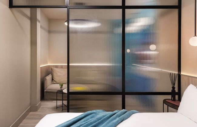 Coeo Peña Design Apartments - Photo 7