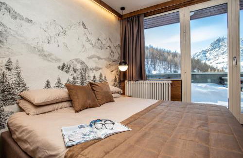 WHISPERING PINES LODGE Mountain view apartment with ski-in access - Foto 1