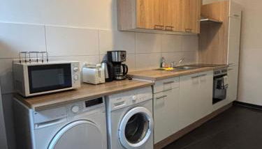 Case Four Boardinghouse mit Parkplatz, Küche, Waschmaschine und Trockner - Foto 3, stove, toaster