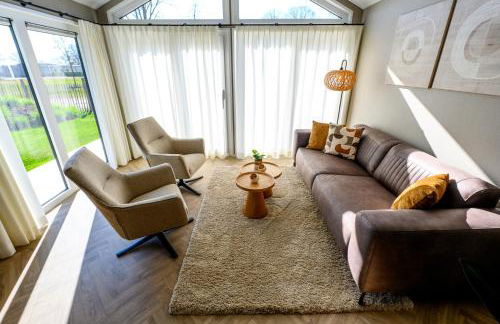 Chalet Charleston 066 mit eigener Terrasse am Wasser - Foto 4