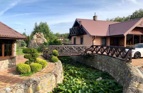 Dom nad stawem przy lesie - Foto 5