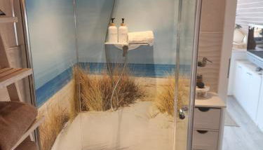 Kleines Apartement mit Dachterrasse und weitem Ausblick - Foto 5