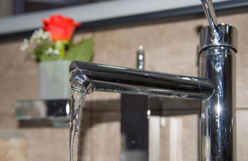 TWIN'S HOME LUXURY SUITES - Photo 17