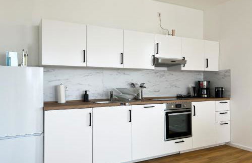 Moderne Apartments im Herzen der Stadt I private Tiefgarage mit Ladesäulen I home2share - Foto 44