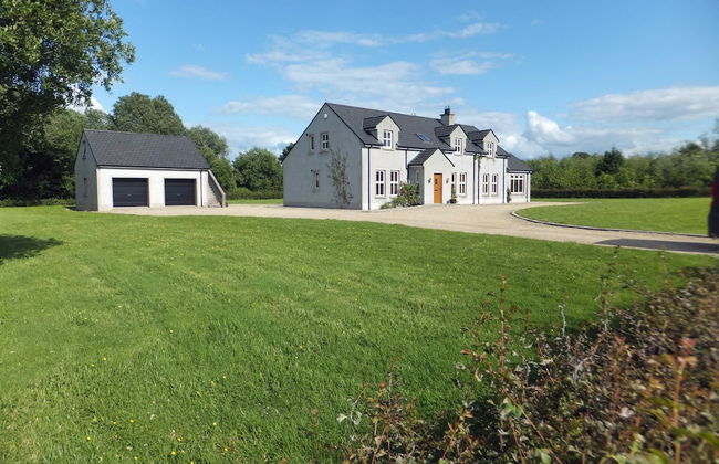The Gatehouse at Mullans Bay - Photo 1
