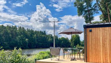 Tinyhouse Seeträumchen direkt am See mit Terrasse für 4 - Foto 1, Garden view