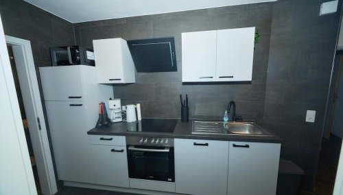 Moderne 3-Zimmer-Wohnung für bis zu 5 Personen, WLAN, Küche - Ideal für Monteure & Gruppen - Foto 4, stove