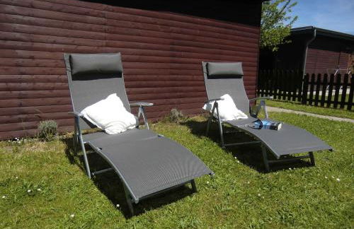 Böltser Hus Ferienwohnungen mit Strandkorb und Kamin 10 Gehminuten zum kurtaxefreien Sandstrand - Foto 35