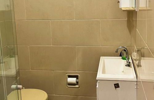 Apartamento a 30m da Praia da Vila Apartamento dos fundos - Photo 6