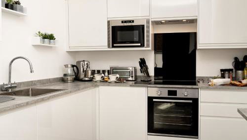 THE PALMS Lux living Condo B'mouth Town Centre & Beach - Photo 5, dishwasher, toaster