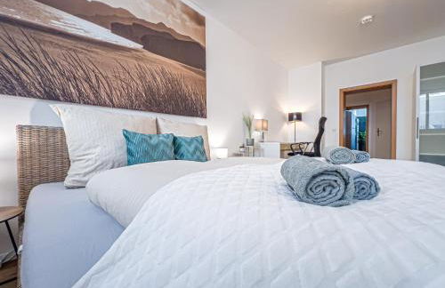 Gemütliche Ferienwohnung mit 2 Schlafzimmern, kostenfreiem Parkplatz, modernem Bad, Küche, Waschmaschine & Trockner - Foto 9