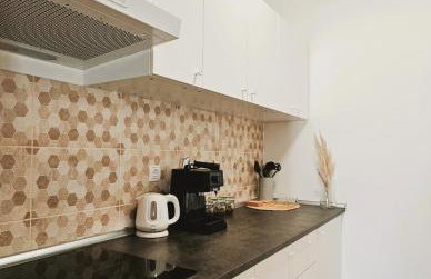 Central Park Apartments - Photo 7