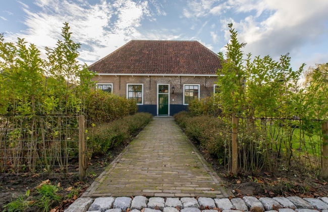 Farmhouse in Zeeland With Windmill Views - Photo 1