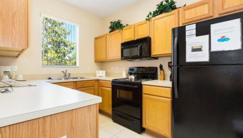 Stunning Regal Oaks 4BR w/ Pool, Spa & Near Disney - Foto 5, stove, dishwasher, toaster, minibar