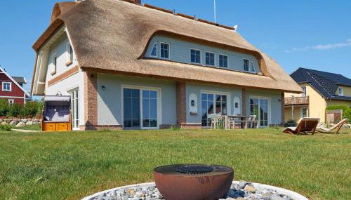 Mönchguter Reethus mit Wasserblick, Kamin, Sauna - Photo 2, Garden