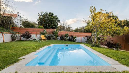 O Lar de Laura Casa familiar para escapada tranquila con piscina y sala de juegos cerca de Vigo - Photo 5, sunbed, Garden view