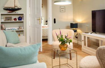 Kapitaenshaus in Wasserlage! Traumapartments Warnemuende - Foto 1