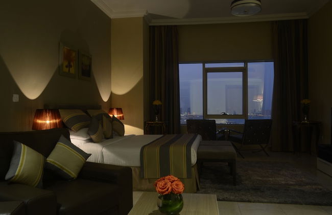 Magnum Hotel & Suites West Bay - Foto 12