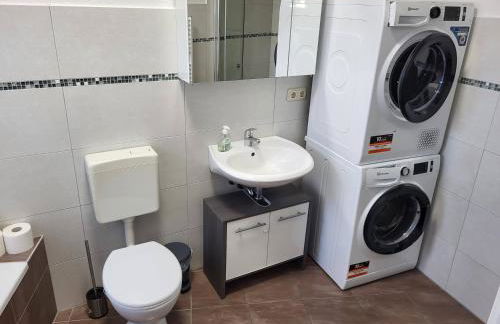 Einzelwohnung im EG mit Terrasse und AC - Foto 8