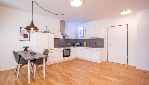 Moderne Neubauwohnung bei Köln - Foto 3, stove