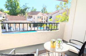 Poolside 2BR Condo with Balcony & Workspace - Photo 45