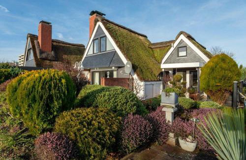 Am-hohen-Ufer-Reetdach-Haus-Happy-Haus - Foto 2