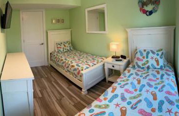 Coconut Castaway - Ocean Views, Walk to Beach, Golf Cart, Club Pool - Photo 11