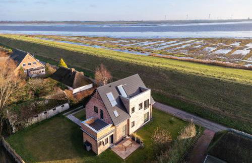 Deichkoje12 Deck 1 EG direkt am Eiderdeich nur 7 km bis zur Nordsee und 20 Min bis Sankt Peter Ording - Foto 1