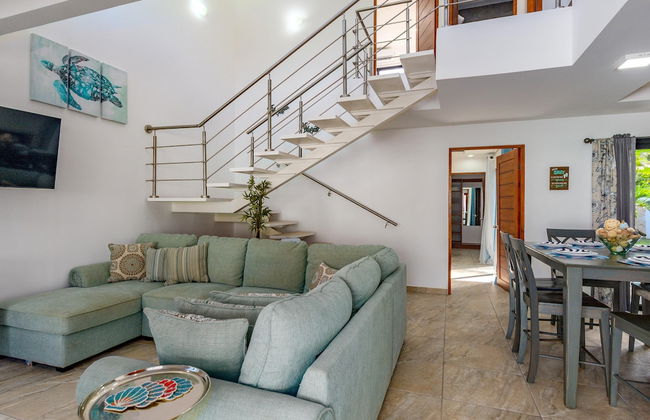 Ultramodern Townhome with an Inviting Coastal Design and Lush Outdoor Oasis with a Private Pool - Photo 17