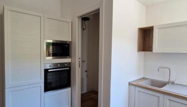 Ten Apartment - Foto 4, stove