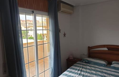 Dúplex mediterráneo con piscina y cenador - Foto 12