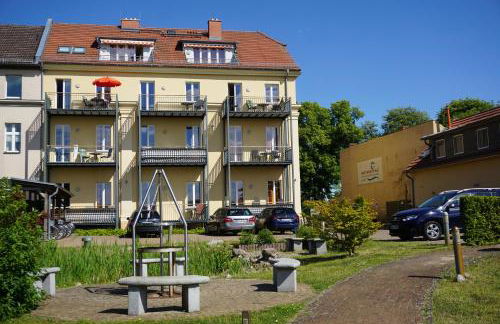 Einraumapartment im Erdgeschoss mit Seeblick - Foto 1